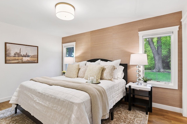3930 Cottage Ln, Minnetonka, MN 55305 - bedroom with baseboards and wood finished floors