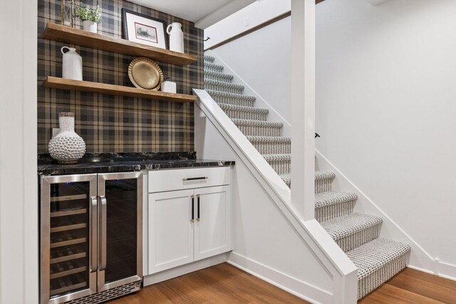 3930 Cottage Ln, Minnetonka, MN 55305 - indoor dry bar with wine cooler, wood finished floors, and stairway