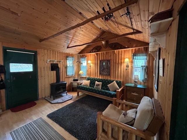 N11464 Fremont Ave, Chicog Twp, WI 54888 - living area with wooden ceiling, wood finished floors, wooden walls, and a wood stove