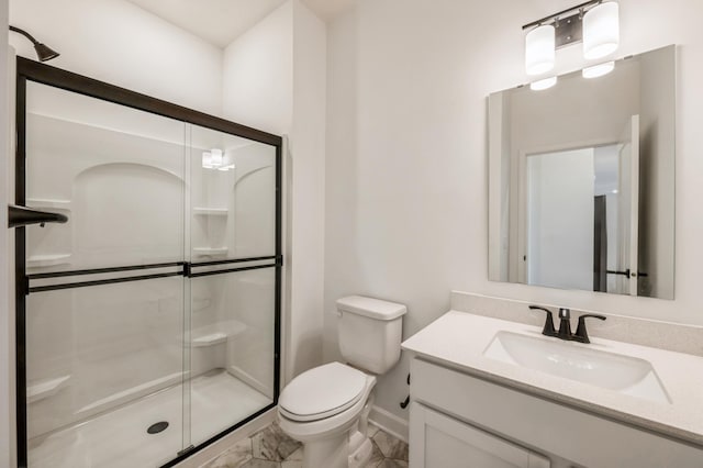 2711 Aspen Dr, Shakopee, MN 55379 - bathroom featuring toilet, marble look tiles, vanity, a stall shower, and baseboards