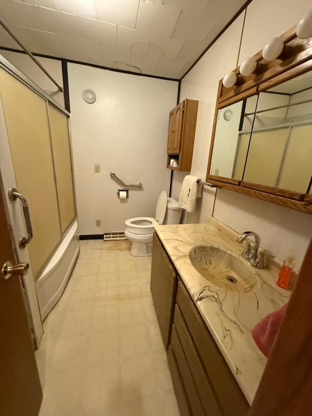 306 1st St, Belview, MN 56214 - bathroom featuring tile patterned floors, vanity, and combined bath / shower with glass door