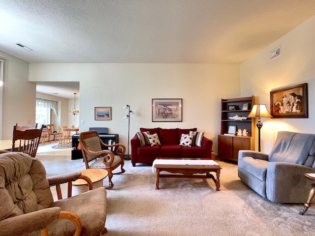 727 Cloud St NW, Bemidji, MN 56601 - living room with light colored carpet and a textured ceiling