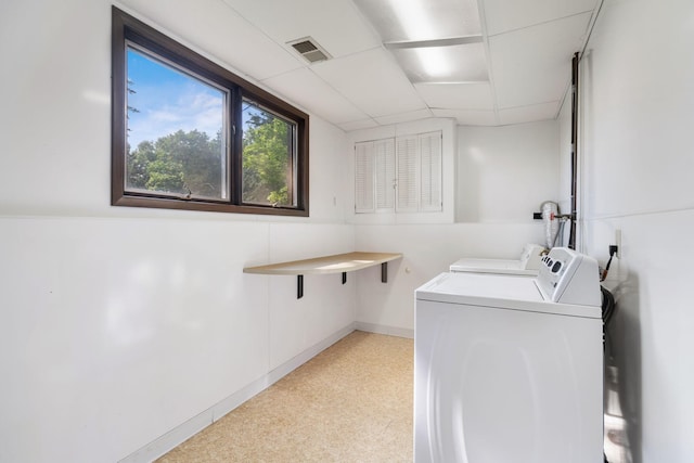 17855 Round Lake Blvd NW, Andover, MN 55304 - washroom featuring washer and dryer and baseboards