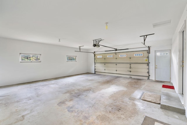 17855 Round Lake Blvd NW, Andover, MN 55304 - garage featuring a garage door opener