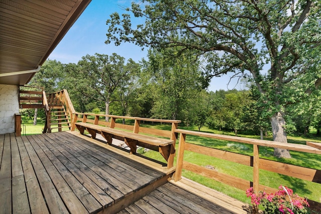 17855 Round Lake Blvd NW, Andover, MN 55304 - wooden terrace featuring stairs, a lawn, and view of wooded area