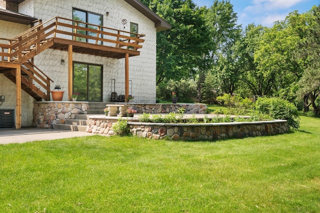 17855 Round Lake Blvd NW, Andover, MN 55304 - view of green lawn with stairway and a wooden deck