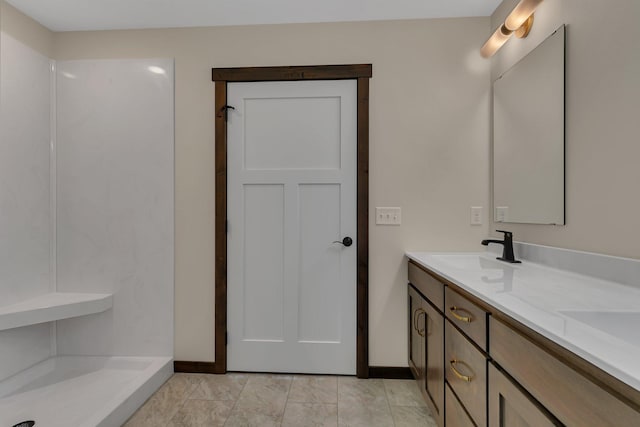 5815 Rivers Edge Dr, Saint Cloud, MN 56303 - full bath with double vanity, baseboards, and a shower
