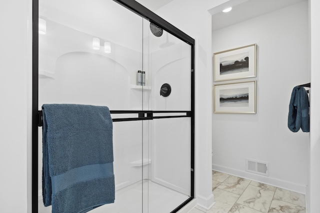 3908 Helmo Ave N, Oakdale, MN 55128 - full bath with marble finish flooring, a stall shower, baseboards, and recessed lighting