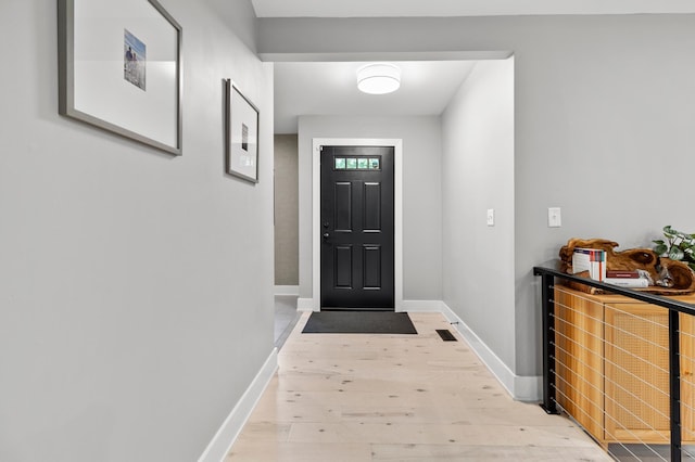6855 Timber Crest Dr, Maple Grove, MN 55311 - foyer with light wood-style flooring and baseboards