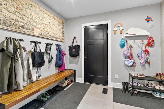 6855 Timber Crest Dr, Maple Grove, MN 55311 - mudroom featuring baseboards and tile patterned flooring