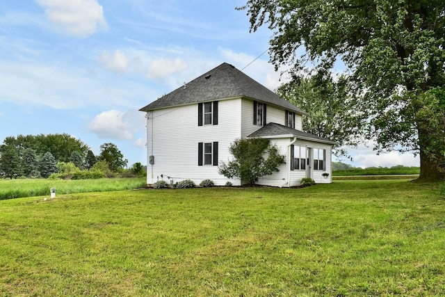 29827 Elfmanns Dr, Wilson Twp, MN 55987 - rear view of house with a yard and a shingled roof