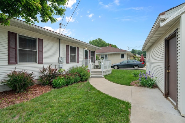 2022 Nokomis Ave, Saint Paul, MN 55119 - view of front of home with a front yard and a deck