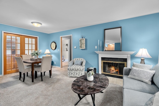 2022 Nokomis Ave, Saint Paul, MN 55119 - carpeted dining space with a glass covered fireplace and french doors