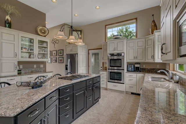 512 Greenview Ct, Sartell, MN 56377 - kitchen with appliances with stainless steel finishes, dark cabinets, white cabinetry, plenty of natural light, and recessed lighting