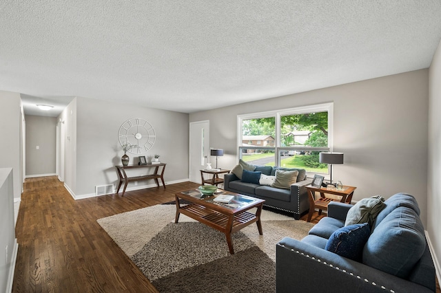 17900 Weaver Lake Dr, Maple Grove, MN 55311 - living area with wood finished floors, a textured ceiling, and baseboards