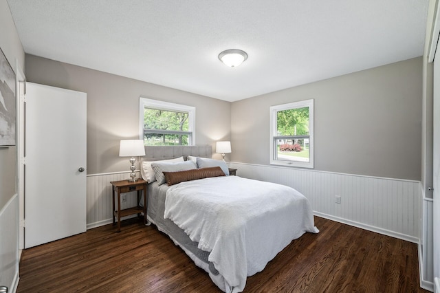 17900 Weaver Lake Dr, Maple Grove, MN 55311 - bedroom with a wainscoted wall and wood finished floors