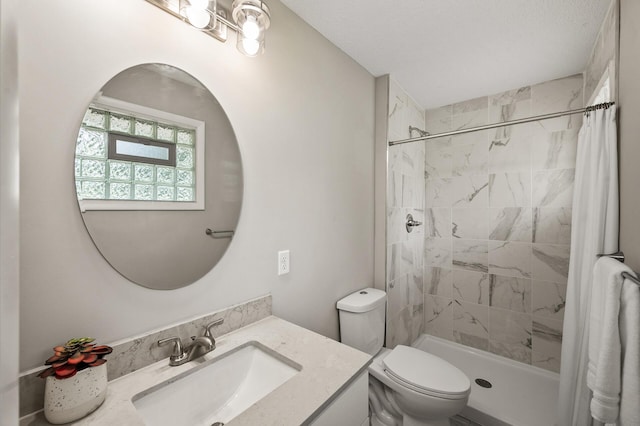 17900 Weaver Lake Dr, Maple Grove, MN 55311 - full bathroom with vanity, toilet, and tiled shower