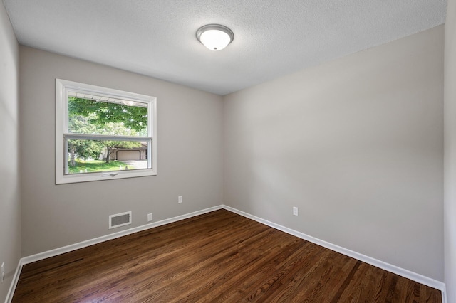 17900 Weaver Lake Dr, Maple Grove, MN 55311 - unfurnished room featuring dark wood-style flooring and baseboards