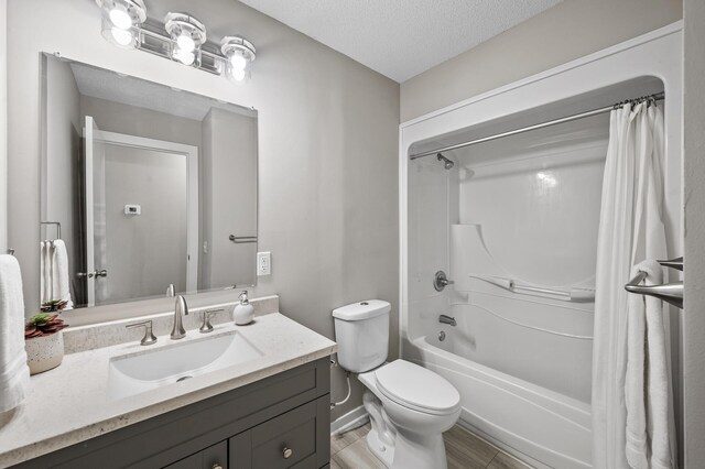 17900 Weaver Lake Dr, Maple Grove, MN 55311 - bathroom with vanity, shower / tub combo, toilet, and a textured ceiling