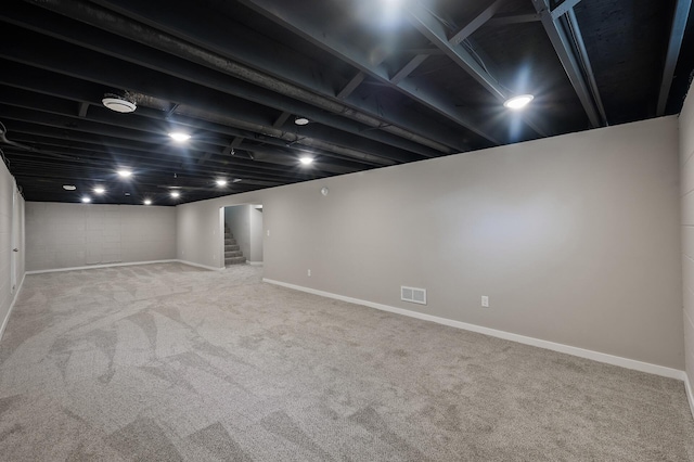 17900 Weaver Lake Dr, Maple Grove, MN 55311 - finished below grade area with stairway, carpet flooring, and baseboards