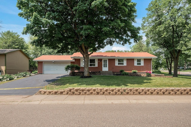 17900 Weaver Lake Dr, Maple Grove, MN 55311 - ranch-style house featuring a garage, driveway, a front yard, and entry steps