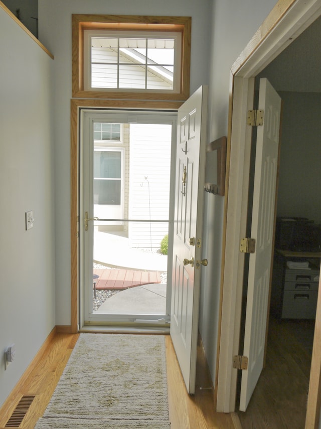 17098 Pheasant Meadow Ln SW, Prior Lake, MN 55372 - doorway with wood finished floors and baseboards