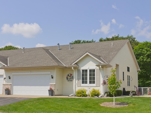 17098 Pheasant Meadow Ln SW, Prior Lake, MN 55372 - view of front facade featuring a garage, a front lawn, roof with shingles, and asphalt driveway