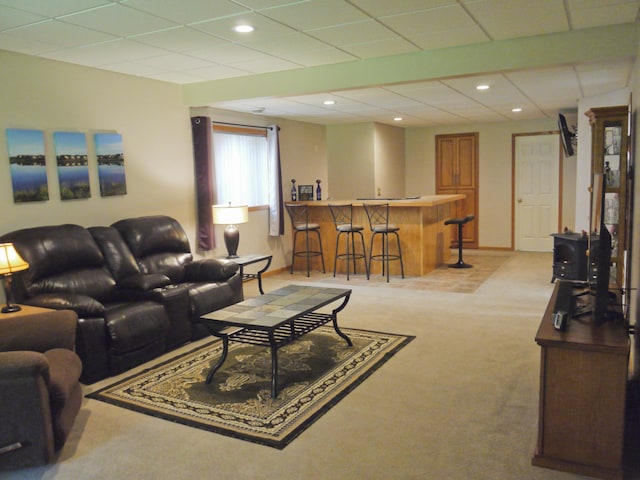 17098 Pheasant Meadow Ln SW, Prior Lake, MN 55372 - living area featuring bar with sink, light colored carpet, and recessed lighting
