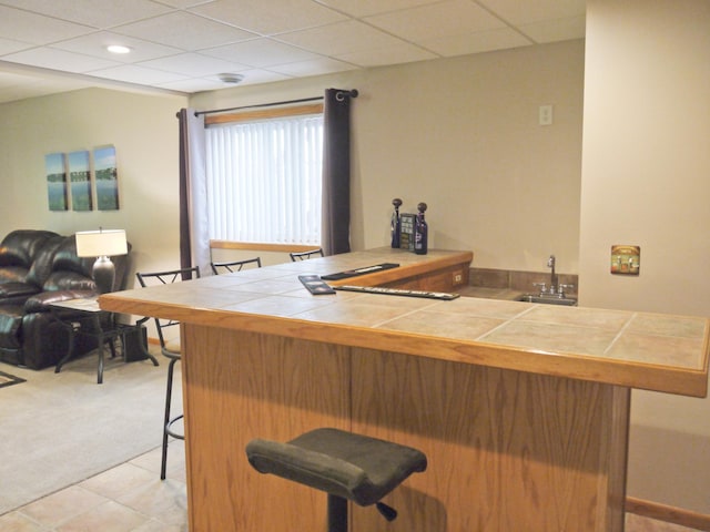 17098 Pheasant Meadow Ln SW, Prior Lake, MN 55372 - indoor wet bar featuring light colored carpet, recessed lighting, and light tile patterned floors