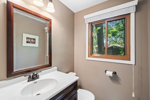 3440 Glenarden Rd, Arden Hills, MN 55112 - half bathroom featuring vanity and toilet