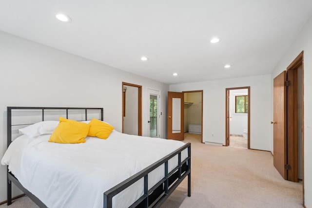 3440 Glenarden Rd, Arden Hills, MN 55112 - bedroom featuring light carpet, recessed lighting, a walk in closet, a closet, and connected bathroom