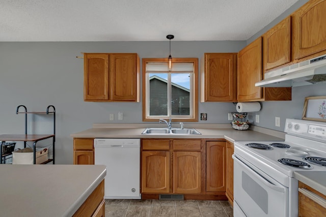 1285 Stone Ridge Rd, Sauk Rapids, MN 56379 - kitchen with white appliances, under cabinet range hood, a sink, and light countertops
