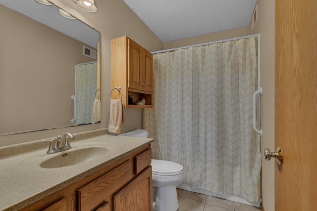 1285 Stone Ridge Rd, Sauk Rapids, MN 56379 - bathroom featuring toilet, vanity, tile patterned flooring, curtained shower, and a textured ceiling