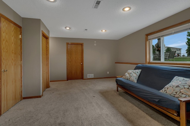1285 Stone Ridge Rd, Sauk Rapids, MN 56379 - living room featuring light colored carpet, baseboards, and recessed lighting