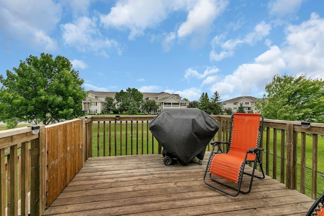 1285 Stone Ridge Rd, Sauk Rapids, MN 56379 - wooden deck featuring a lawn, area for grilling, and a residential view