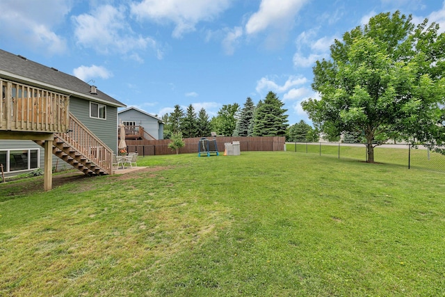 1285 Stone Ridge Rd, Sauk Rapids, MN 56379 - view of yard with stairs and a wooden deck