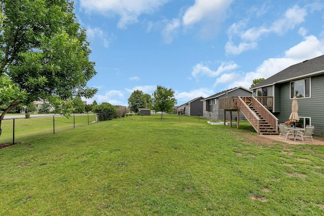 1285 Stone Ridge Rd, Sauk Rapids, MN 56379 - view of yard with stairs, a deck, and a patio