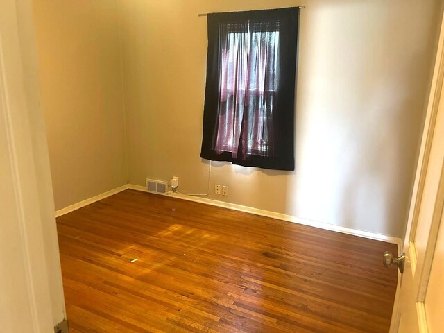 3500 Abbott Ave N, Robbinsdale, MN 55422 - spare room with hardwood / wood-style flooring and baseboards