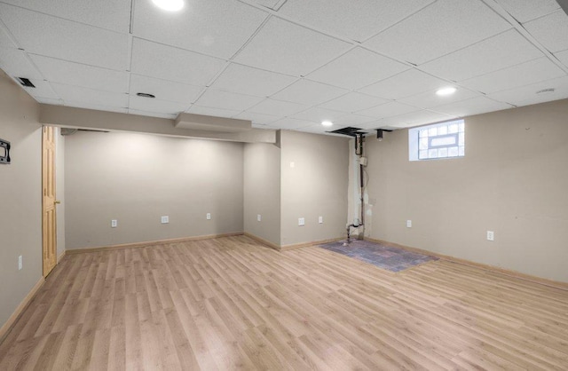 3500 Abbott Ave N, Robbinsdale, MN 55422 - below grade area featuring light wood-type flooring, a paneled ceiling, and recessed lighting