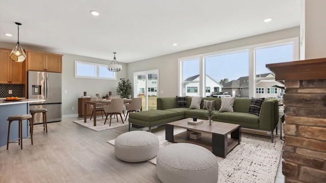 5574 130th Way N, Hugo, MN 55038 - living area featuring light wood-style flooring, recessed lighting, and baseboards