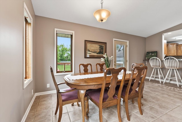 8165 240th St W, Eureka Twp, MN 55044 - dining room featuring healthy amount of natural light, light tile patterned floors, and baseboards
