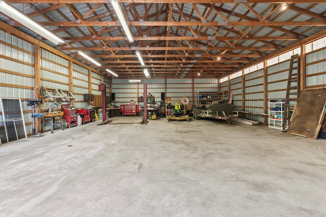 8165 240th St W, Eureka Twp, MN 55044 - garage with metal wall and a workshop area