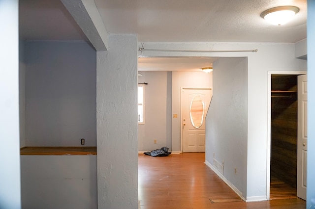 89 Winnipeg Ave, Saint Paul, MN 55117 - hall featuring wood finished floors and baseboards