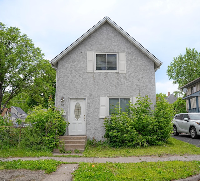 89 Winnipeg Ave, Saint Paul, MN 55117 - view of front of house with stucco siding