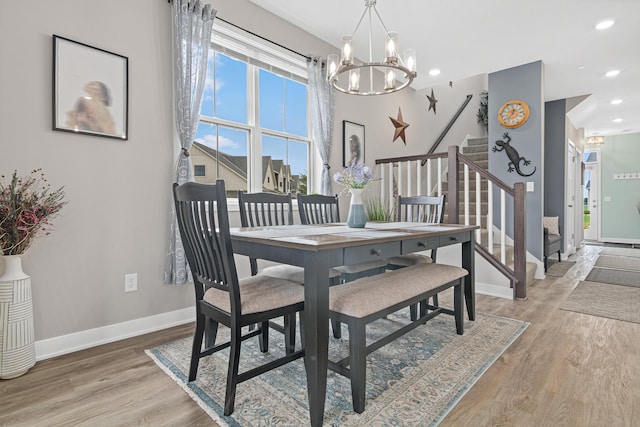 18165 Garland Path, Lakeville, MN 55044 - dining room featuring stairway, a chandelier, light wood-style flooring, and recessed lighting