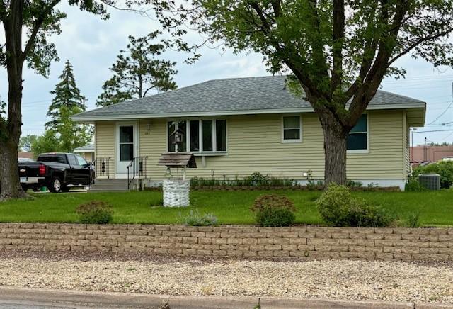 455 113th Ave NW, Coon Rapids, MN 55448 - single story home featuring a front lawn, a shingled roof, and central AC