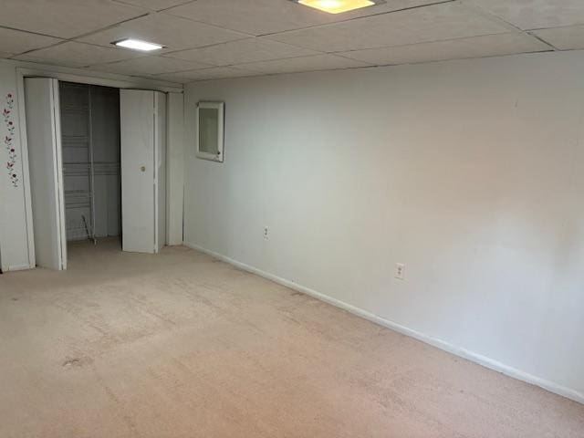 455 113th Ave NW, Coon Rapids, MN 55448 - finished basement featuring a paneled ceiling, baseboards, and light carpet