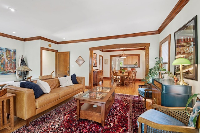 3229 Fremont Ave S, Minneapolis, MN 55408 - living room featuring wood finished floors, crown molding, and recessed lighting