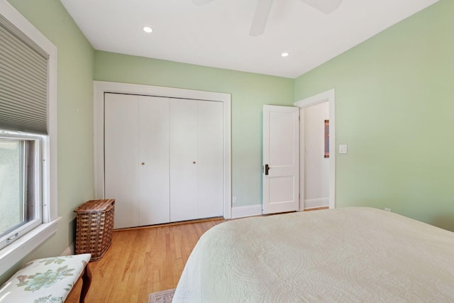 3229 Fremont Ave S, Minneapolis, MN 55408 - bedroom featuring light wood-style flooring, a closet, a ceiling fan, recessed lighting, and baseboards