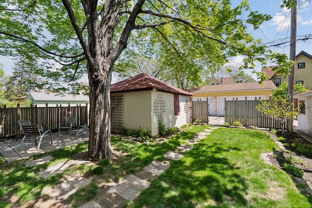 3229 Fremont Ave S, Minneapolis, MN 55408 - view of yard with a patio area and an outdoor structure